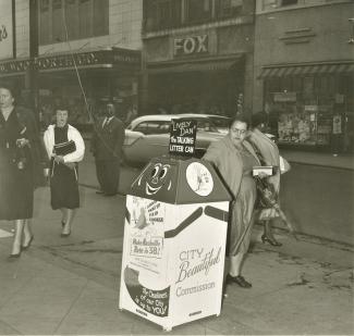 From City Beautiful Scrapbook, view of trash can near the arcade in 1958